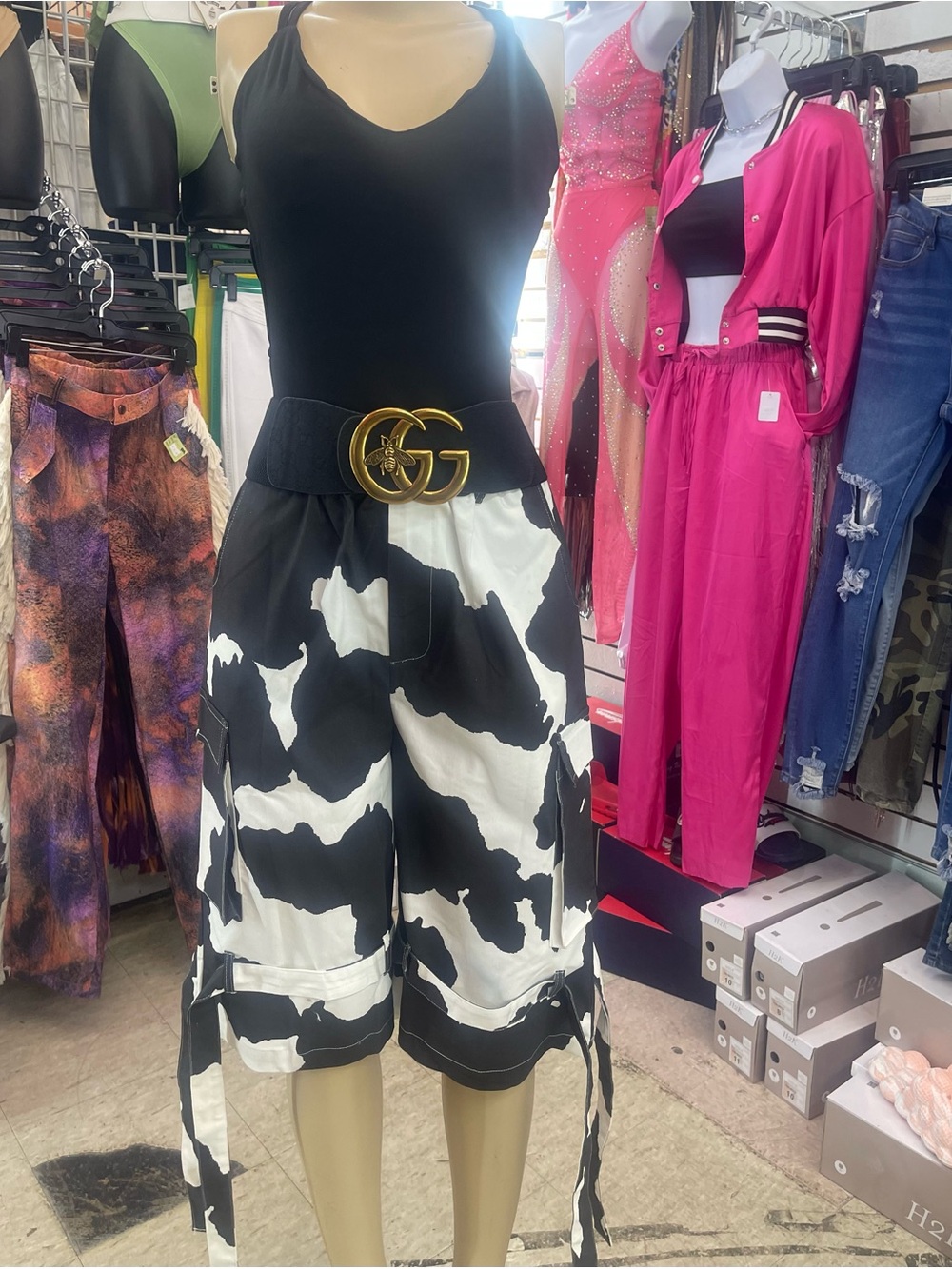 Black & White Cow-Print Cargo Shorts - Women's belt & necklace not included